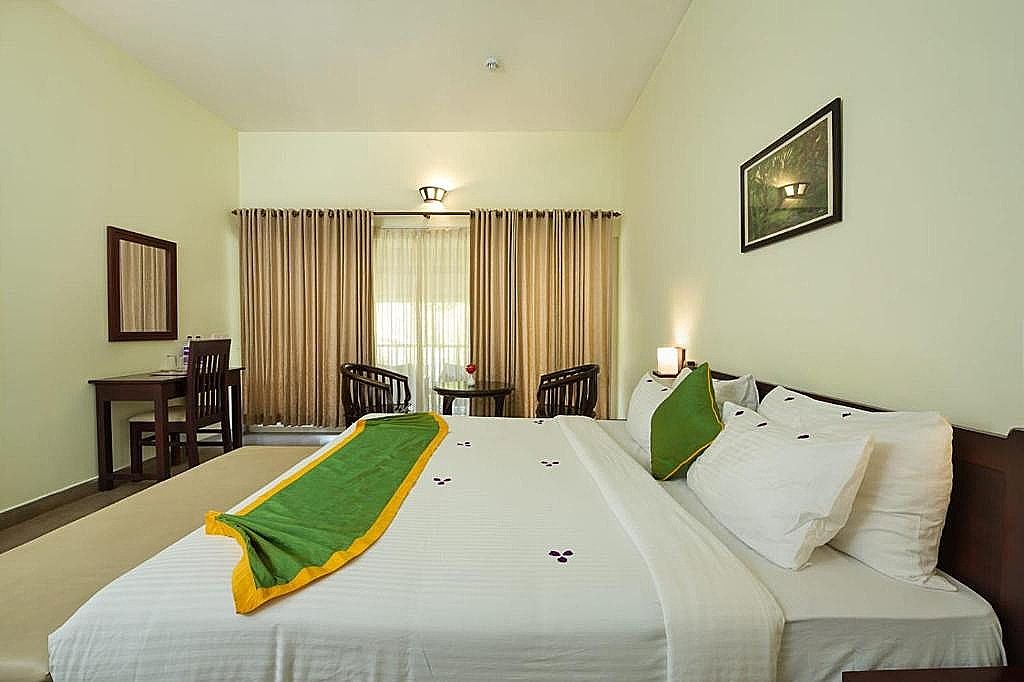 Abad Brookside Wayanad Cottage with Garden View 2