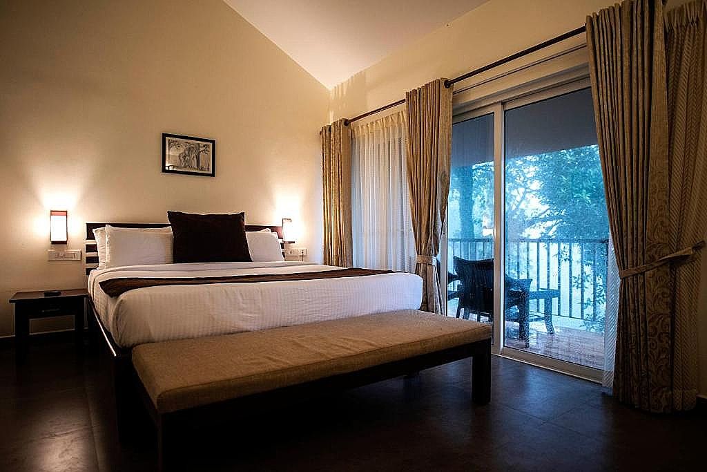 Abad Brookside Wayanad Cottage with Garden View 3