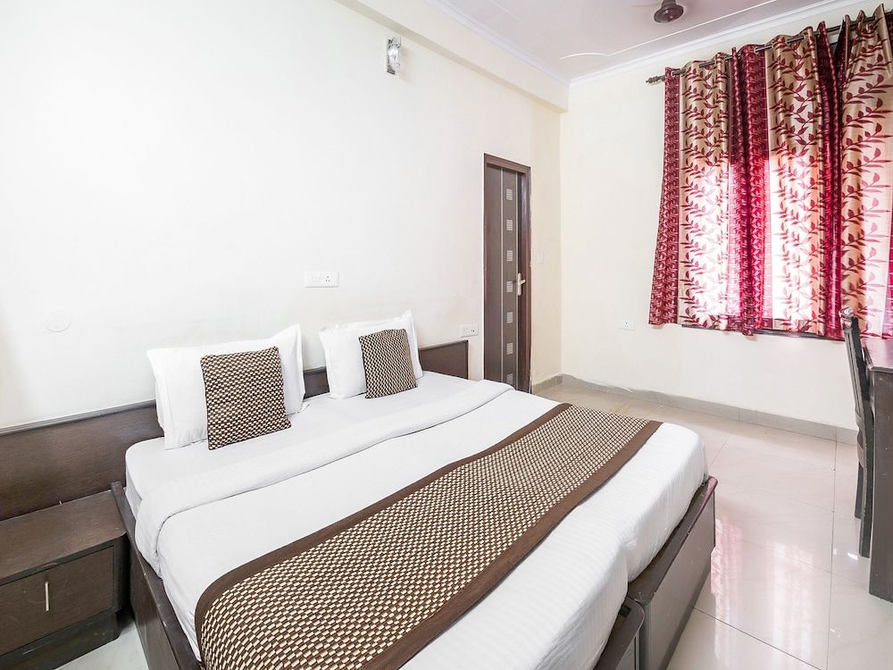 Capital O 15929 Comfort Residency Standard Room 5