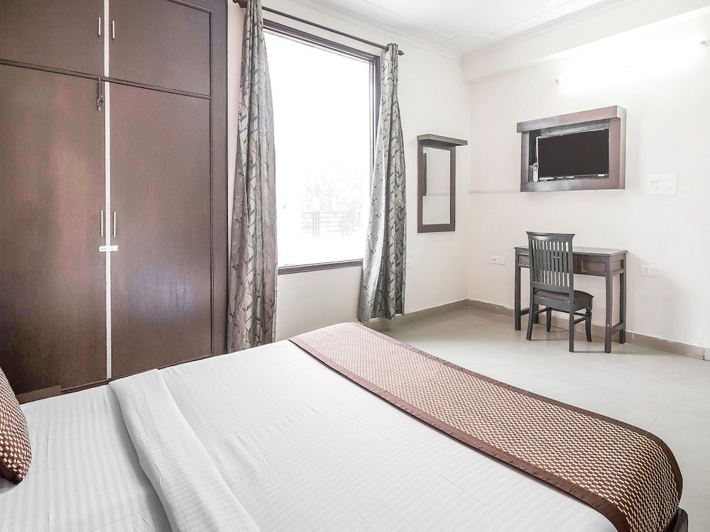 Capital O 15929 Comfort Residency Standard Room 11