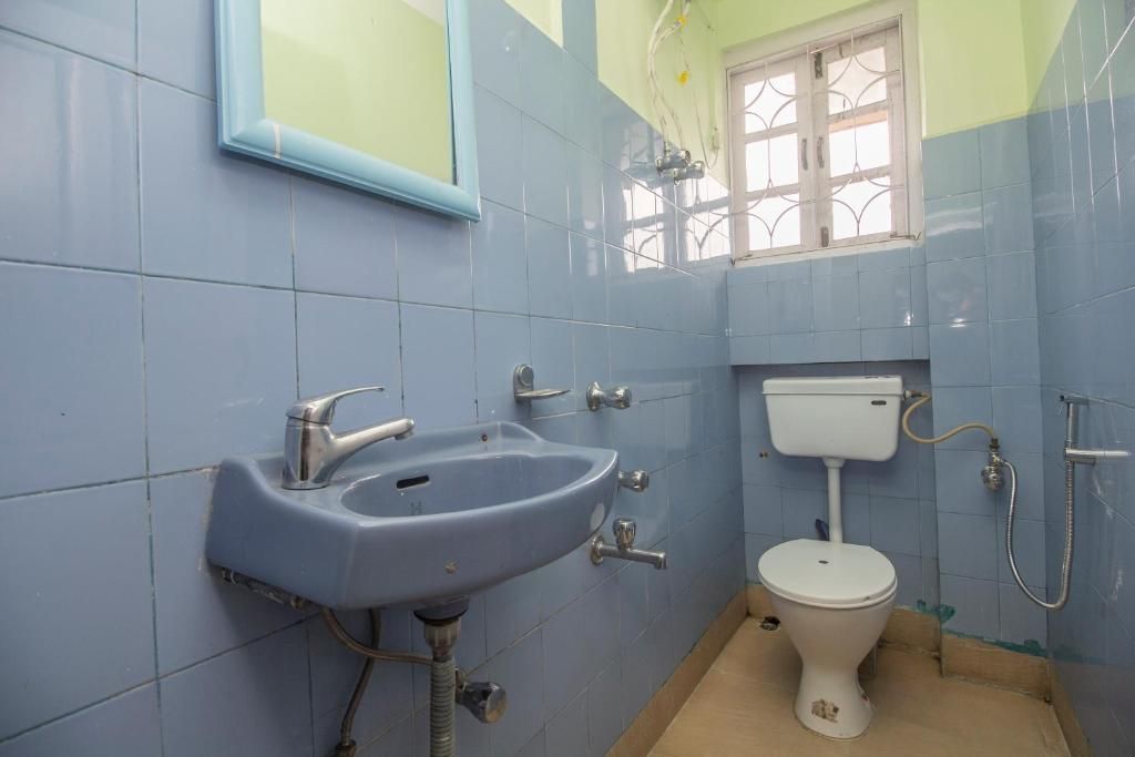 Hotel O by OYO Samfelma Lodge Classic Room 12