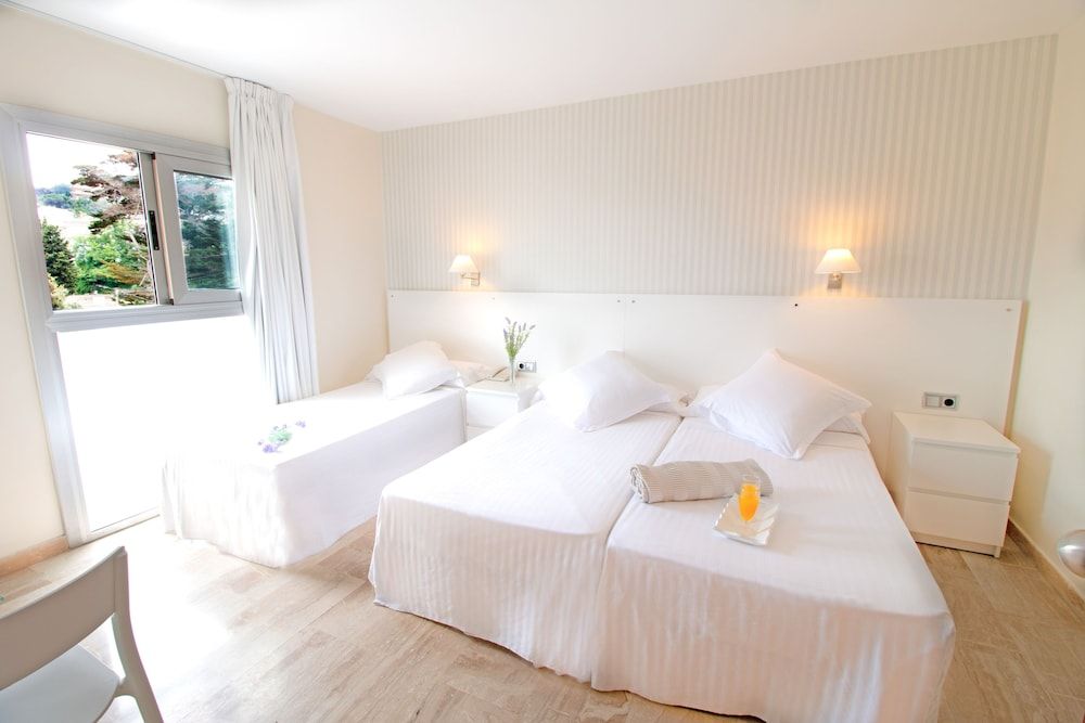 SM Hotel Turissa Triple Room 4