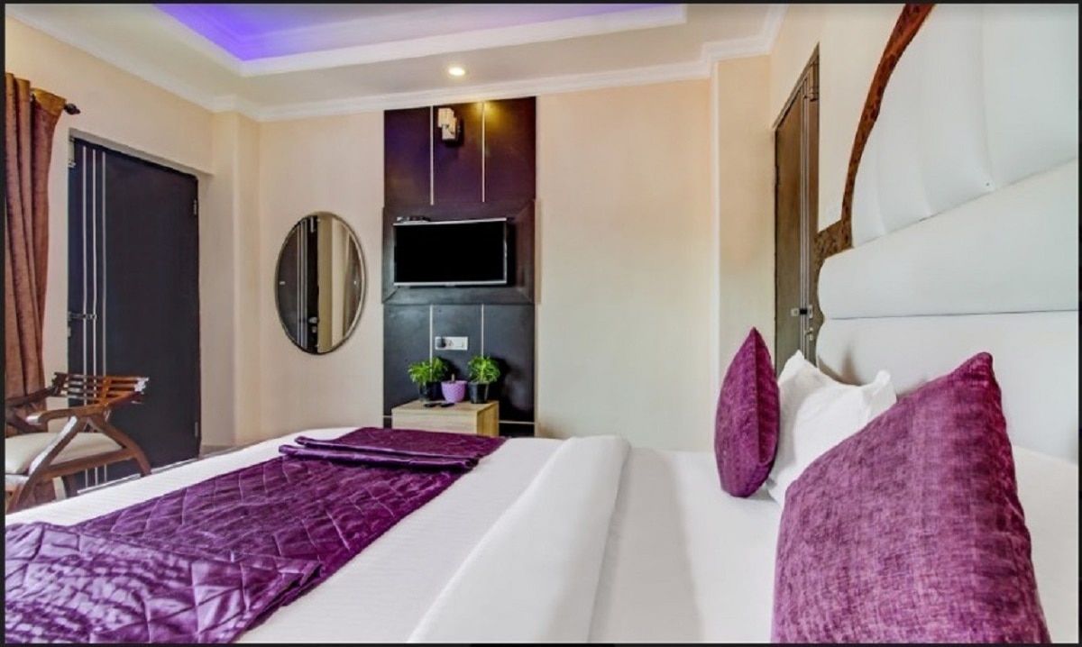 TWO DELUXE ROOMS with washroom in one room for 4 to 7 people, balcony and excellent view