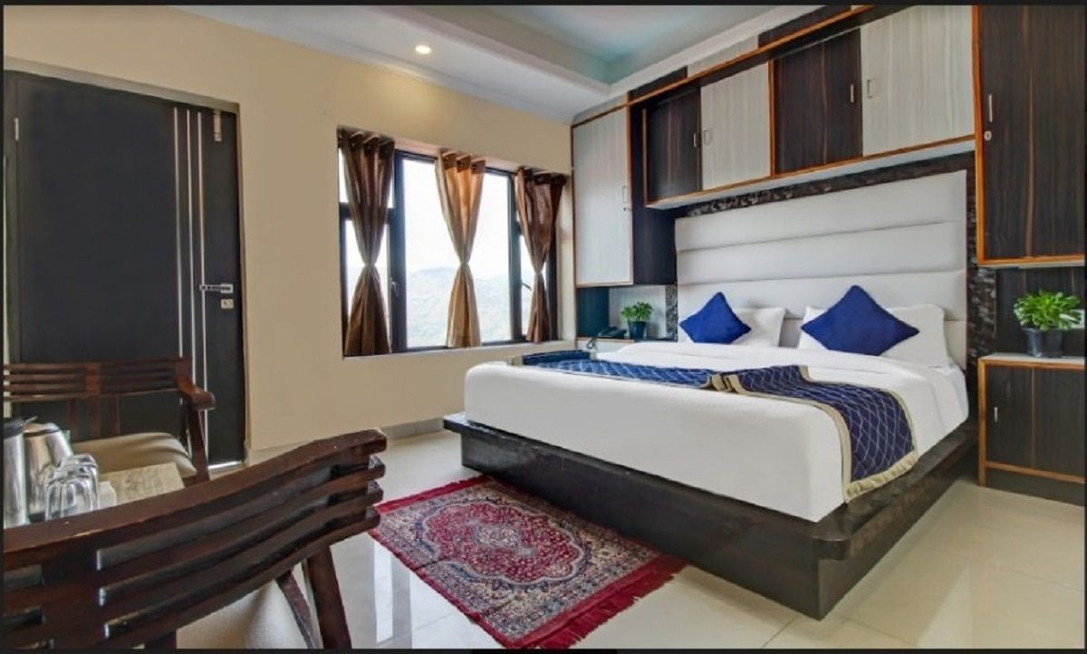 TWO DELUXE ROOMS with washroom in one room for 4 to 7 people, balcony and excellent view