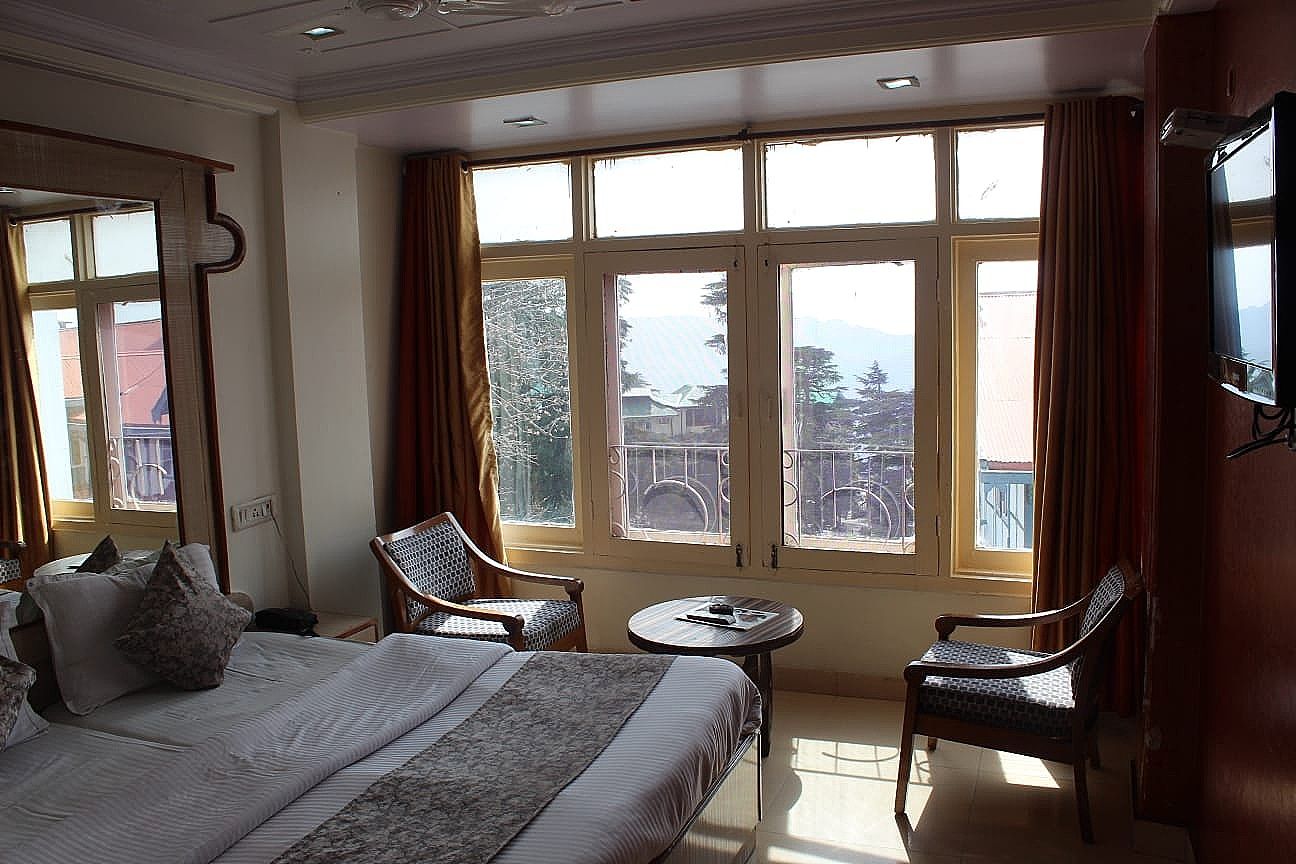 Hotel Cosmos - The Mall Road Shimla Deluxe 2