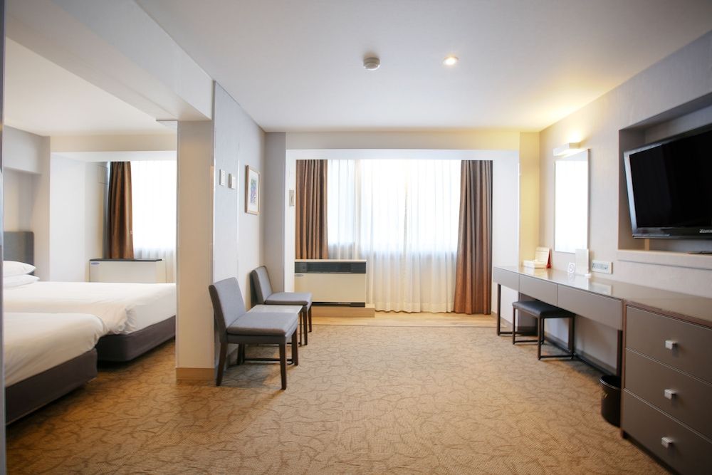 Savoy Hotel Deluxe Twin (No Parking, additional fee occurs if number of people booked & staying are different)