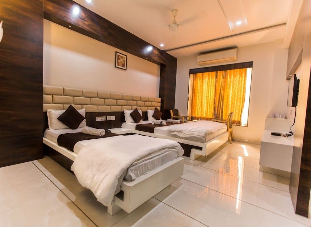 Hotel Fun City Standard Triple AC Room