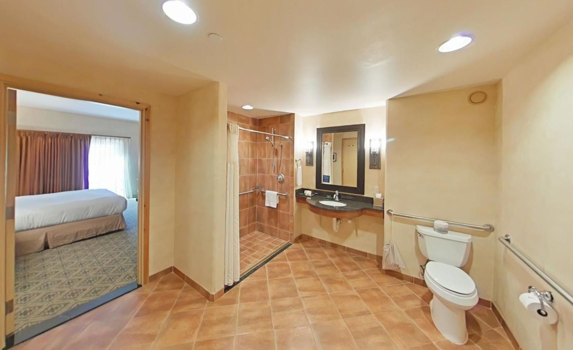 1 KING MOBILITY ACCESSIBLE W/ ROLL IN SHOWER