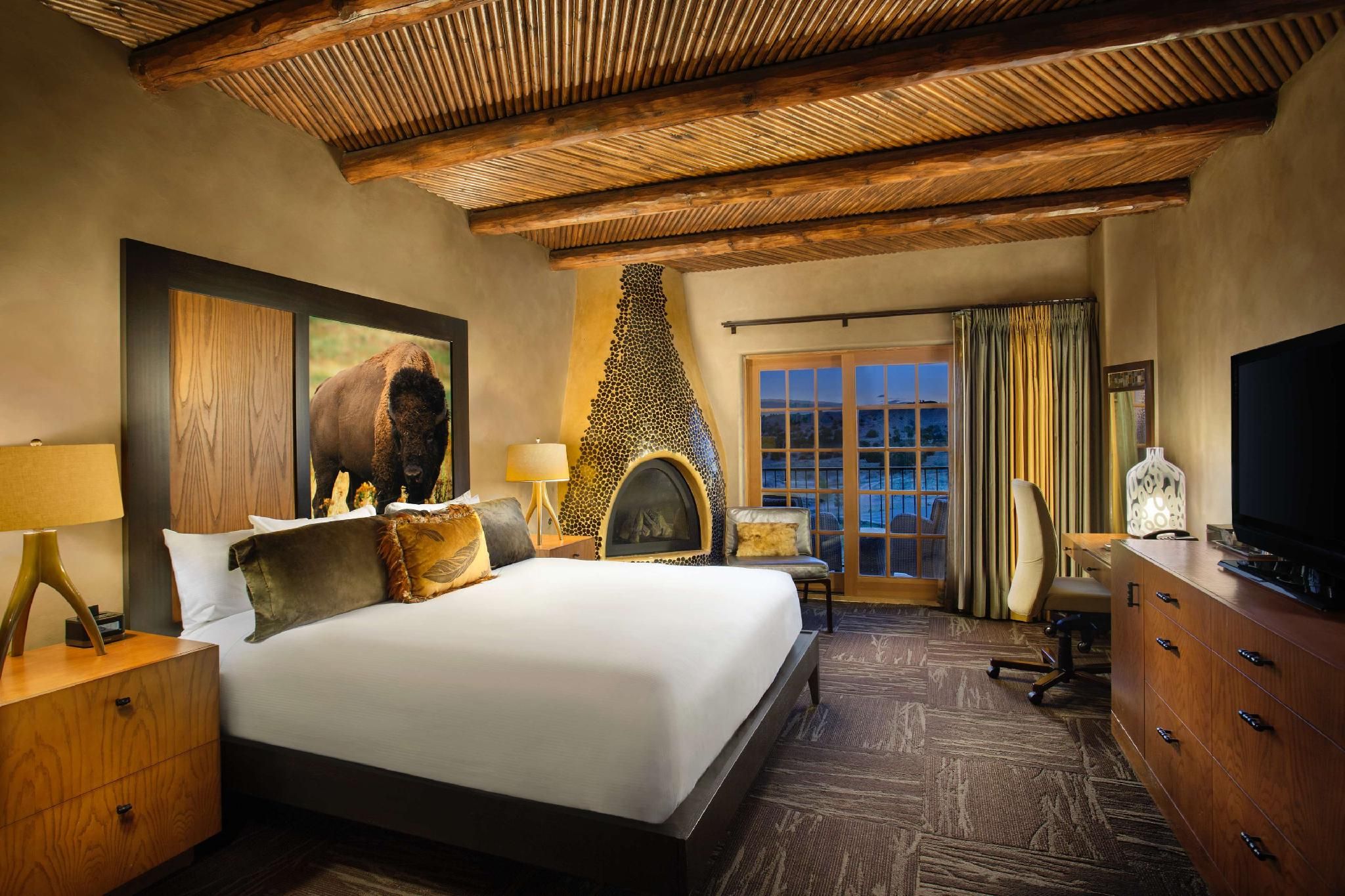 1 king bed room with fireplace