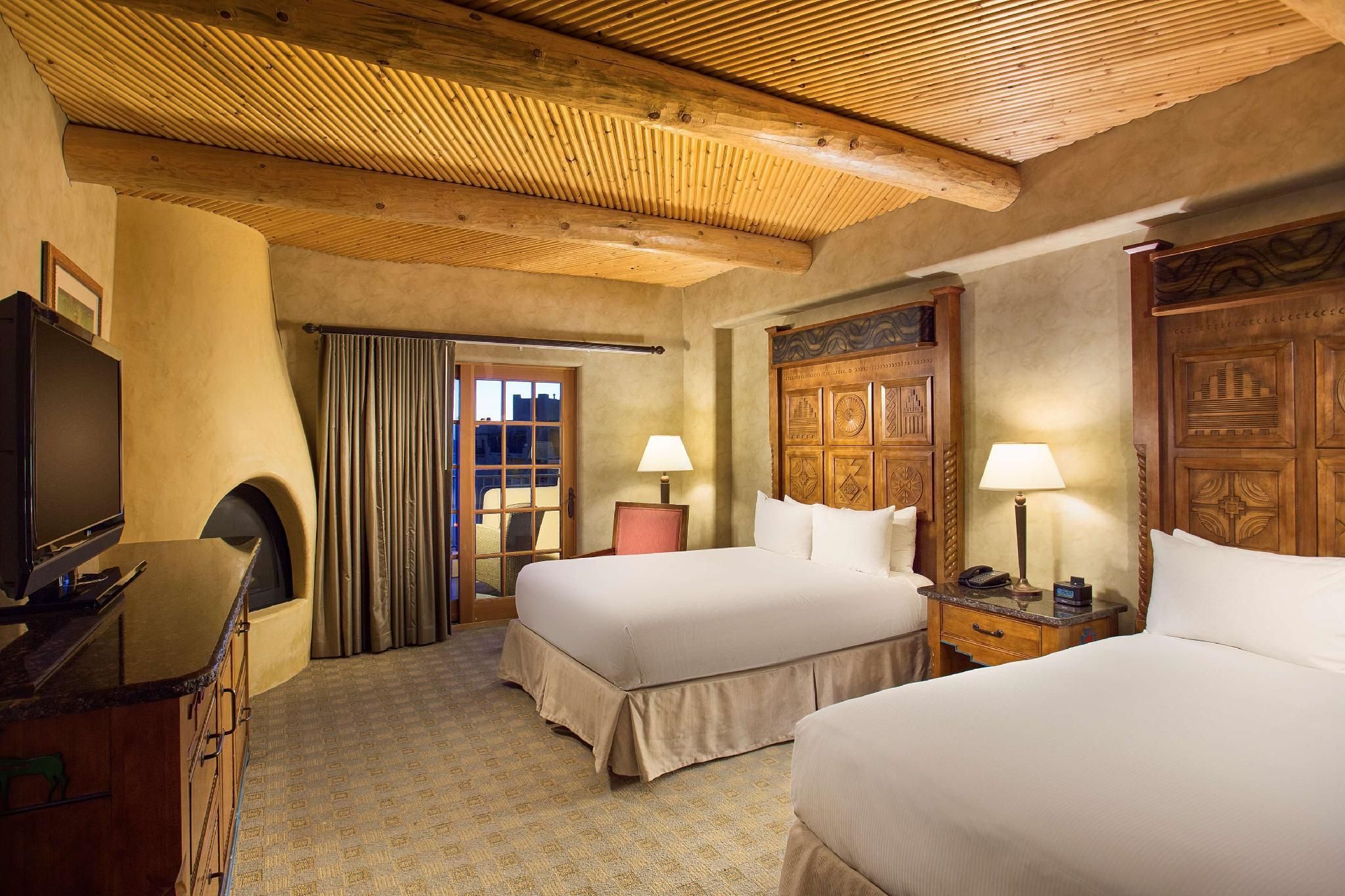 2 queen bed room with fireplace