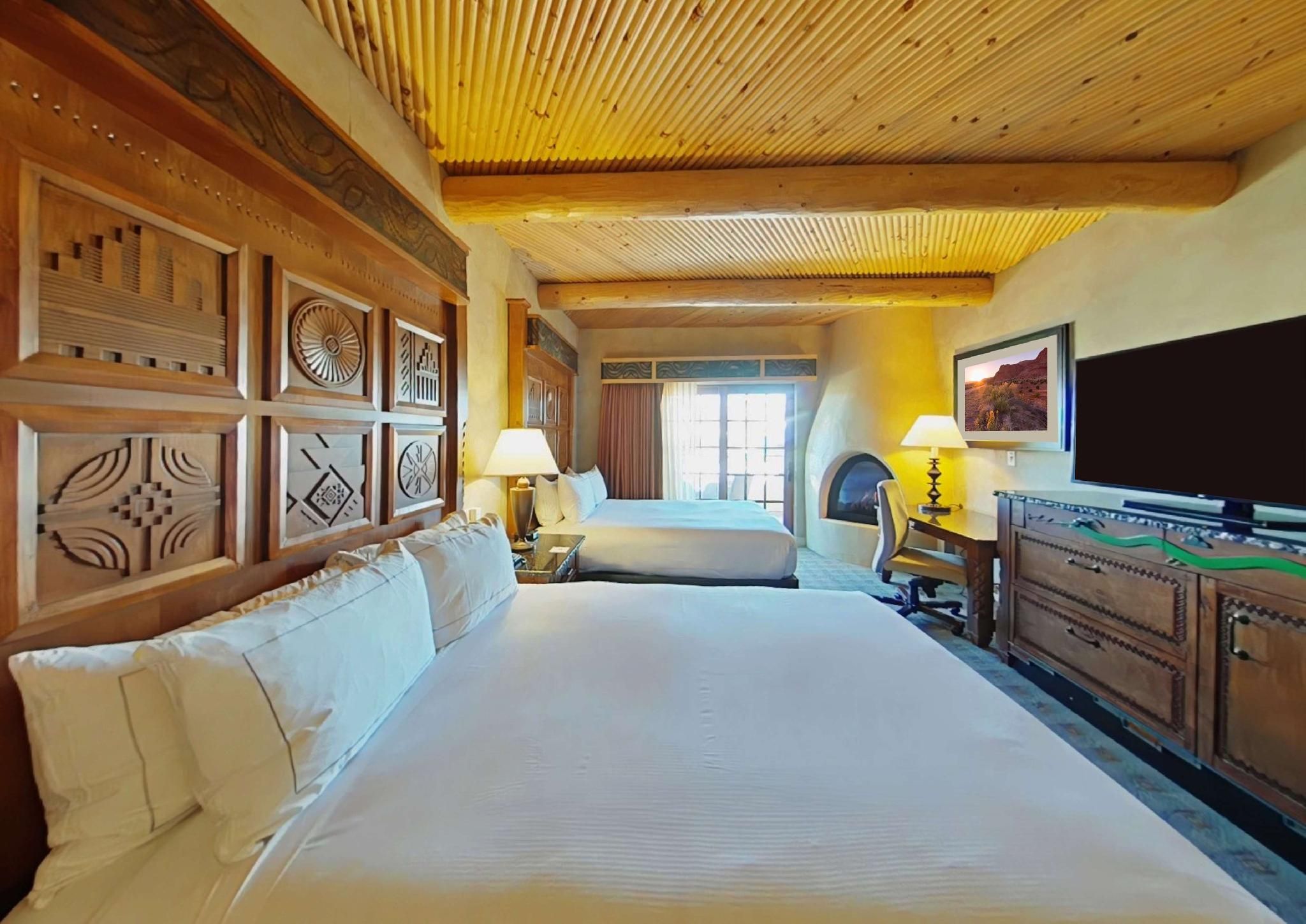 2 queen bed room with fireplace