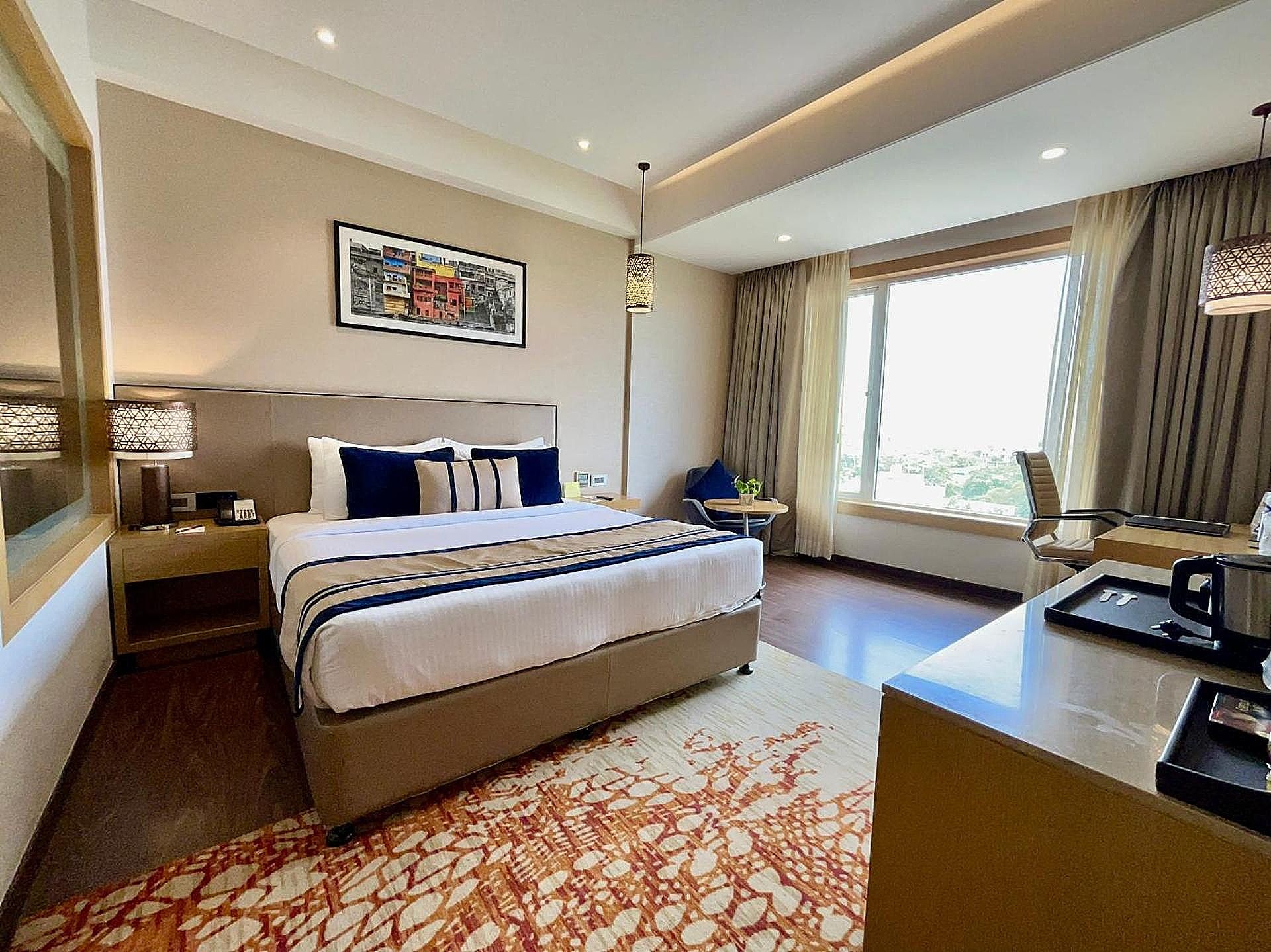 The Fern Residency Sarnath Winter Green Room 5