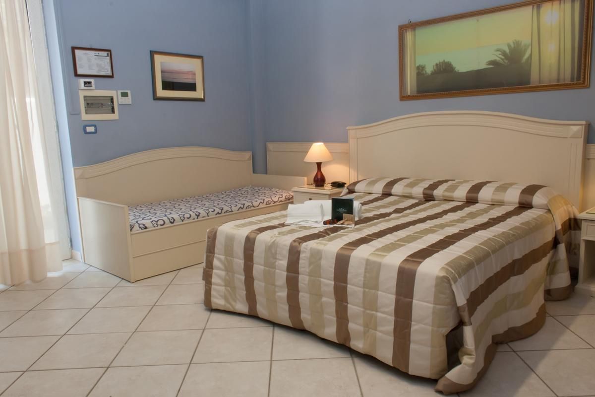 Triple Room (2 Adults + 1 Child)