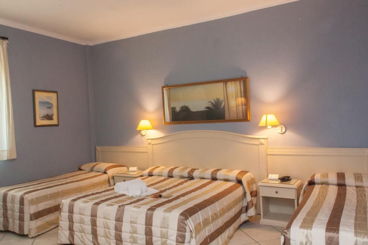 Quadruple Room (2 Adults + 2 Children)