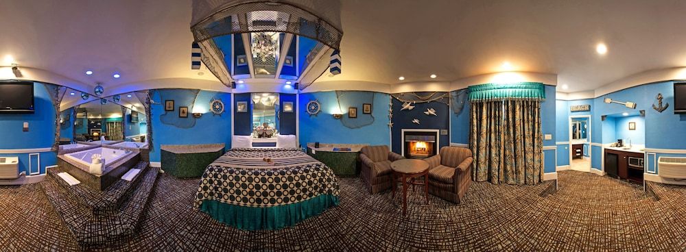 Inn of the Dove Romantic Suites with Jetted Tub & Fireplace Blue Romantic Theme Suite with Jetted Tub & Fireplace 3