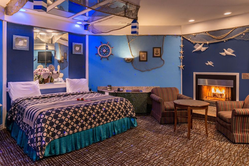 Inn of the Dove Romantic Suites with Jetted Tub & Fireplace Blue Romantic Theme Suite with Jetted Tub & Fireplace