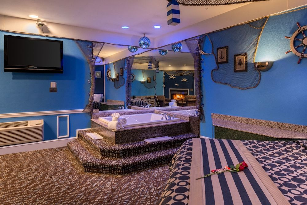 Inn of the Dove Romantic Suites with Jetted Tub & Fireplace Blue Romantic Theme Suite with Jetted Tub & Fireplace 2