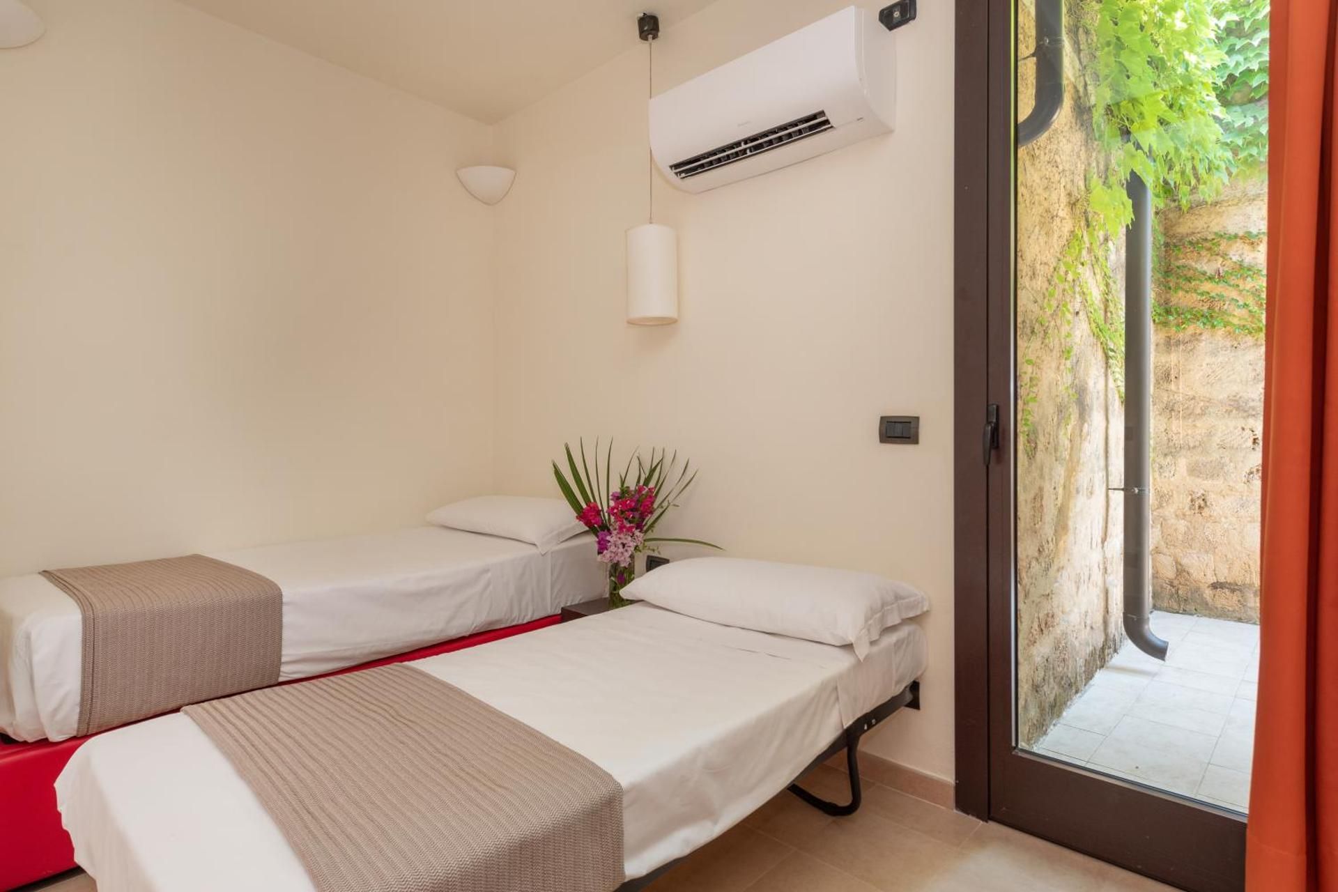 Classic Quadruple Room garden (2 Adults + 2 Children)