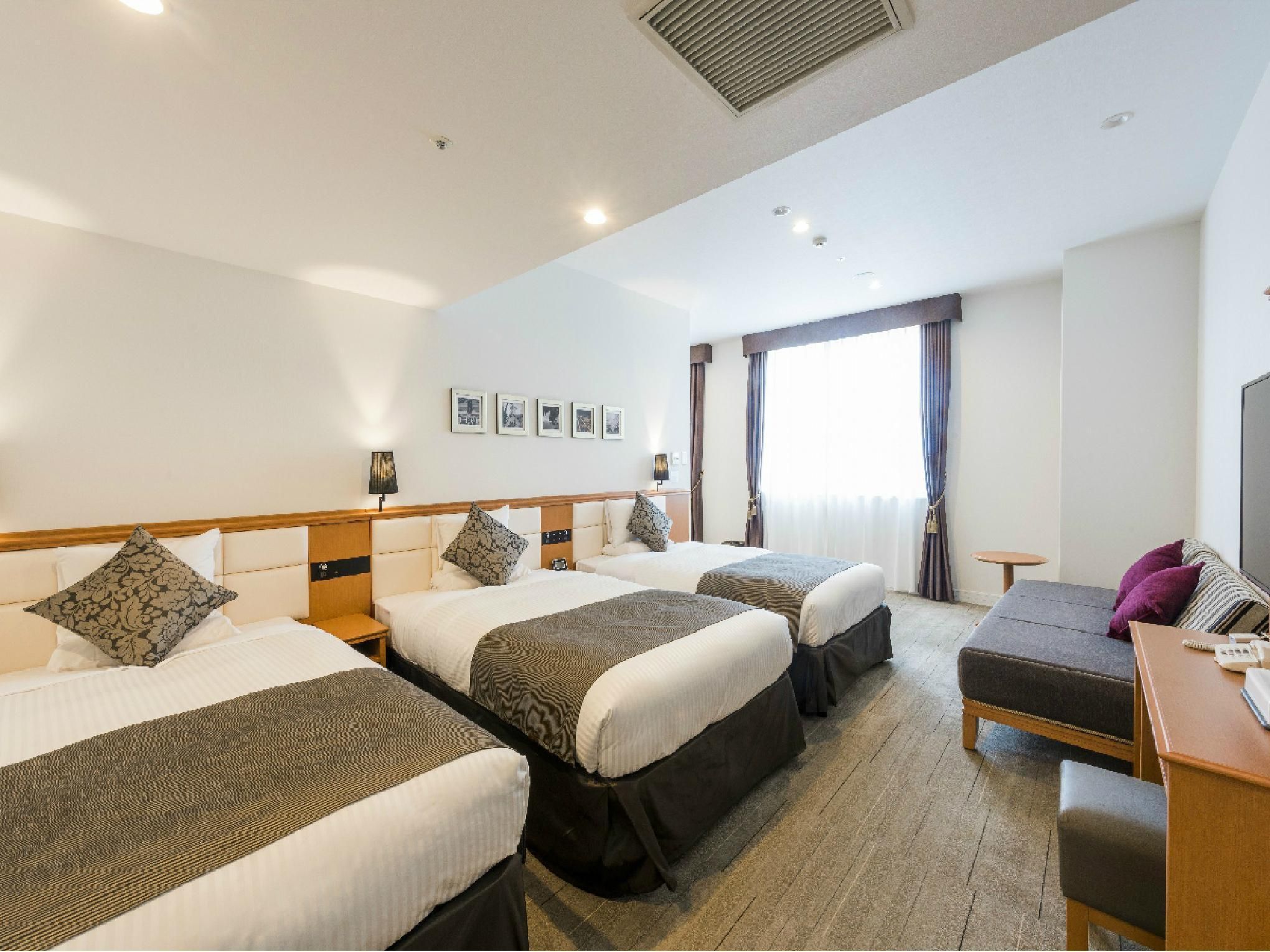Deluxe Triple Room for 4 People - Non-Smoking
