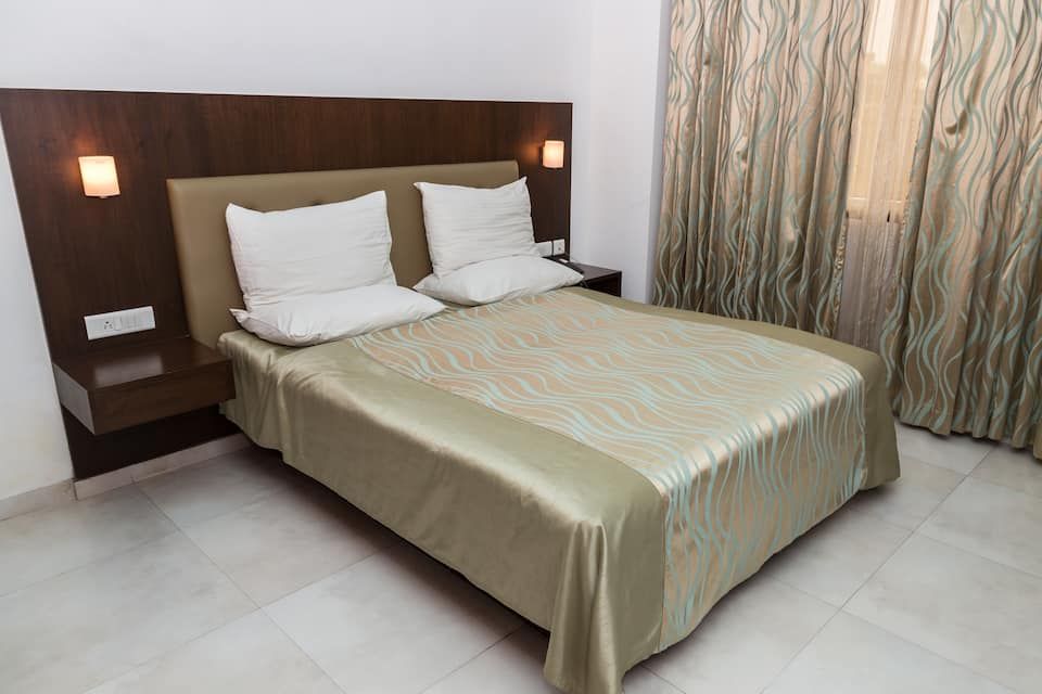 Srinivas Saffron Hotel Deluxe Room 7