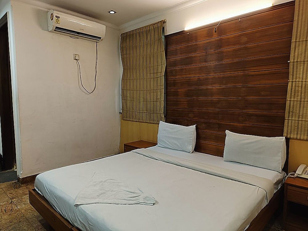 Hotel TJS Grand Deluxe Room