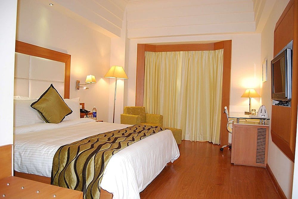 Ambrosia Sarovar Portico Hotel - A Sarovar Hotel Deluxe Room King Bed