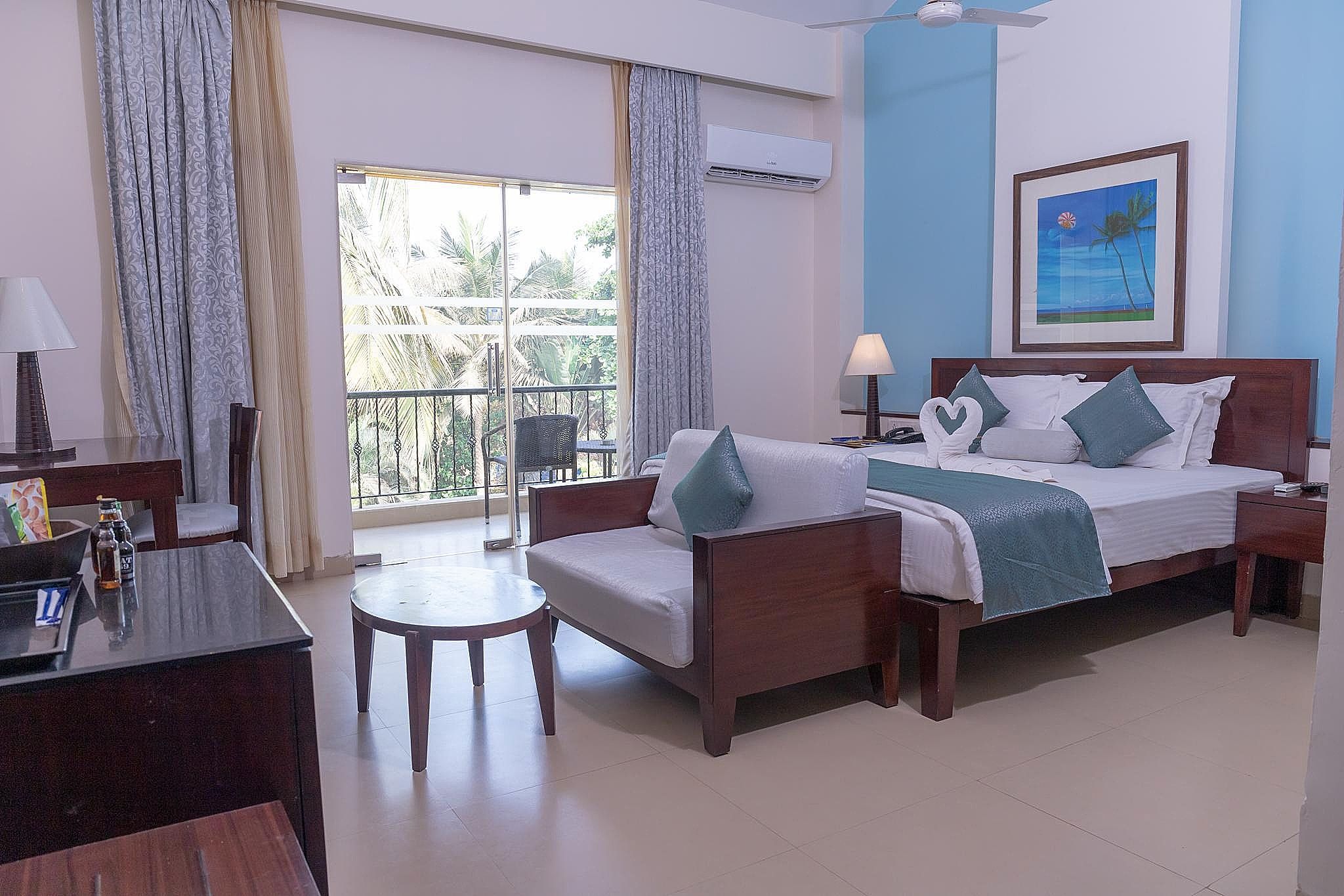 Kyriad Prestige Calangute Goa by OTHPL Deluxe Room with Balcony 2
