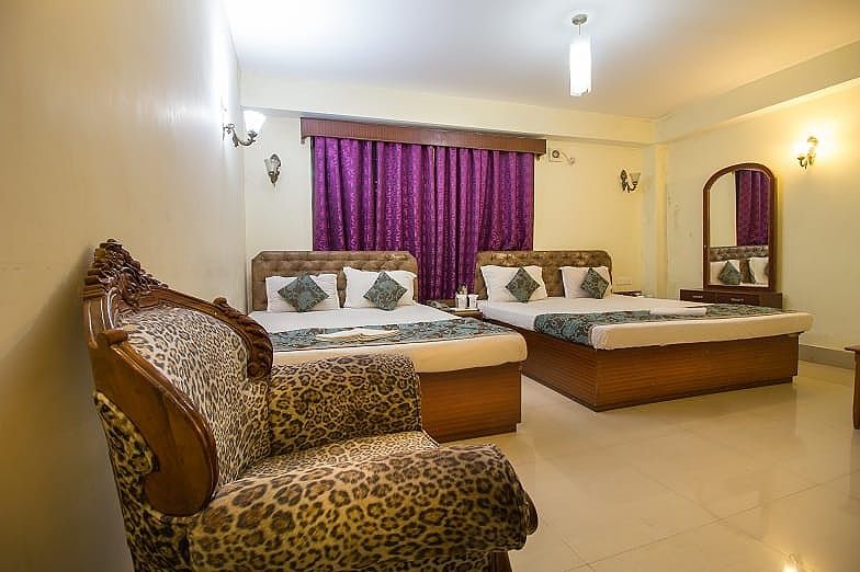 Deluxe Quad Room
