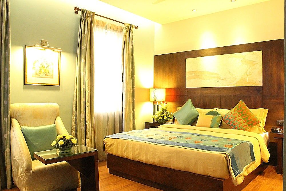juSTa MG Road Deluxe Room 8