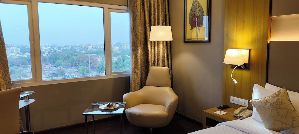 Royal Orchid Central Akota Vadodara Premium Club Room 8