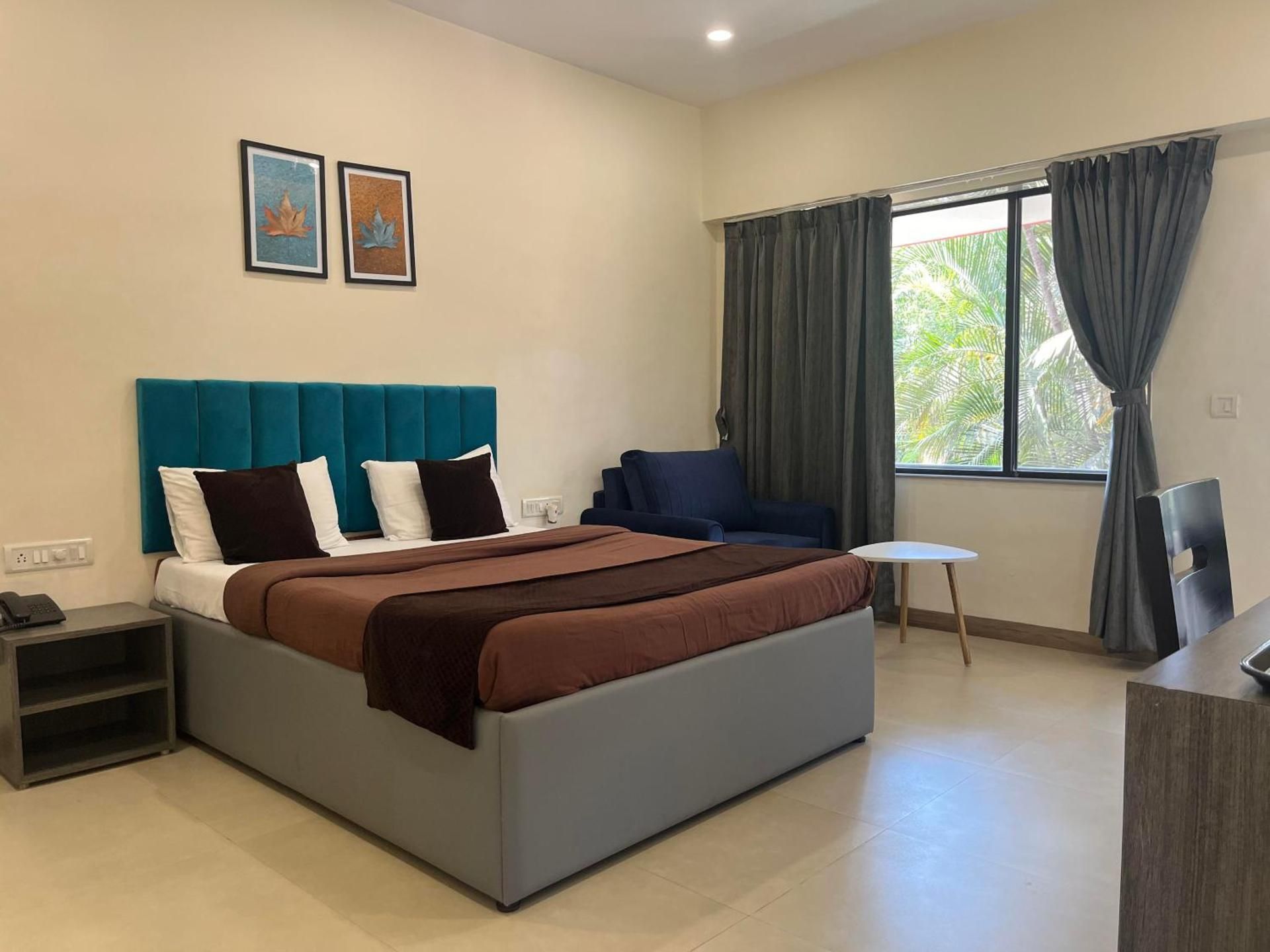 Girivihar Dining & Holiday Club Deluxe Room 5