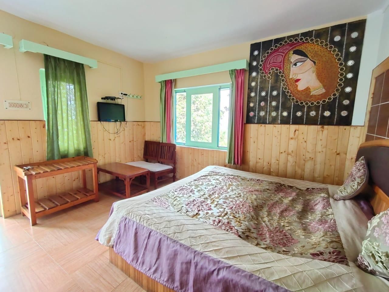 Trishul Orchard Resort Deluxe Room
