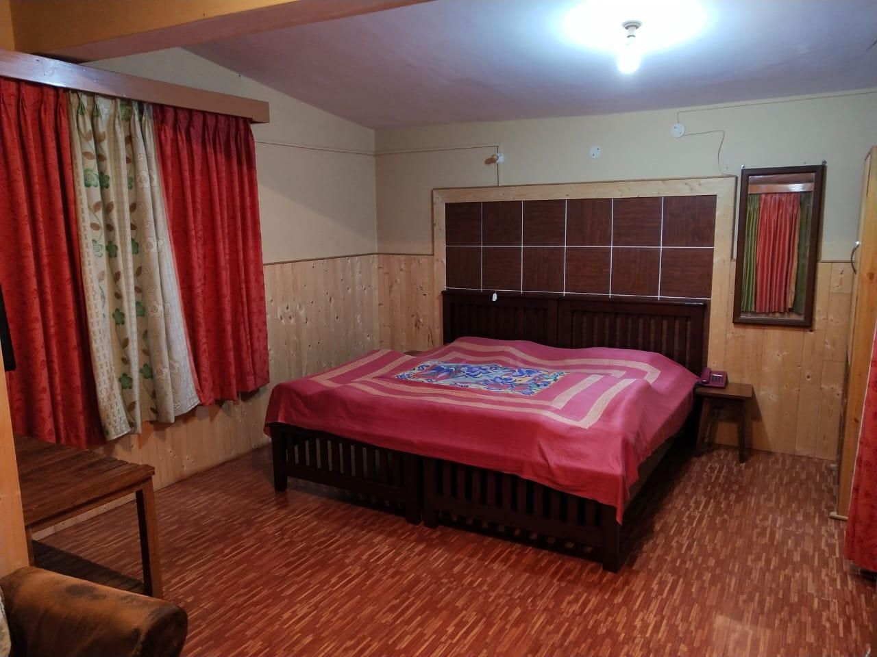 Trishul Orchard Resort Deluxe Room 3