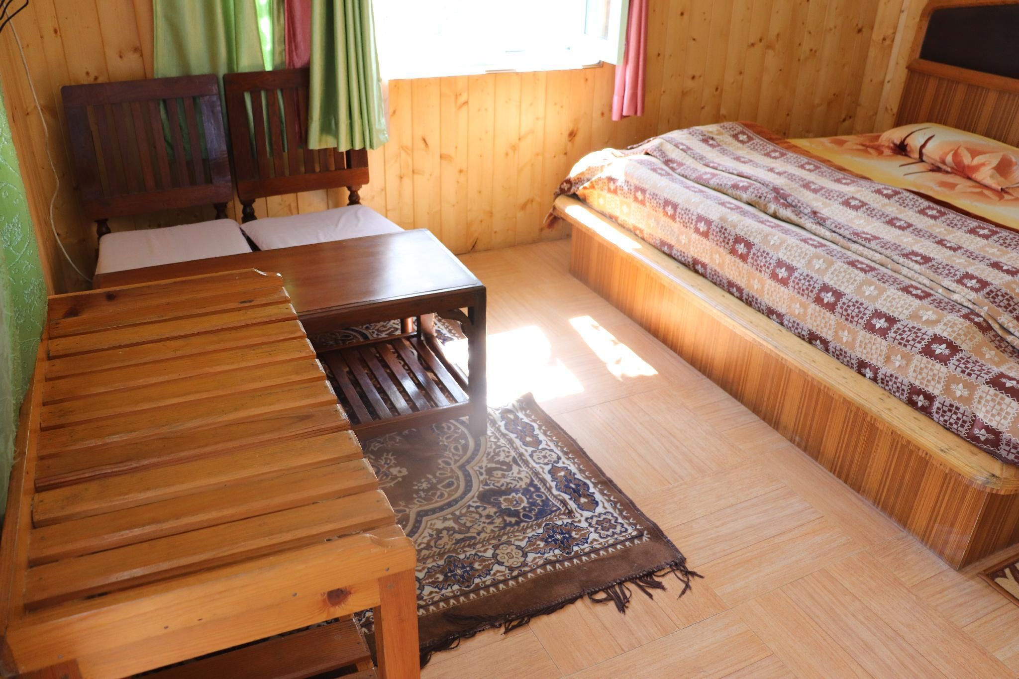 Trishul Orchard Resort Deluxe Room 2
