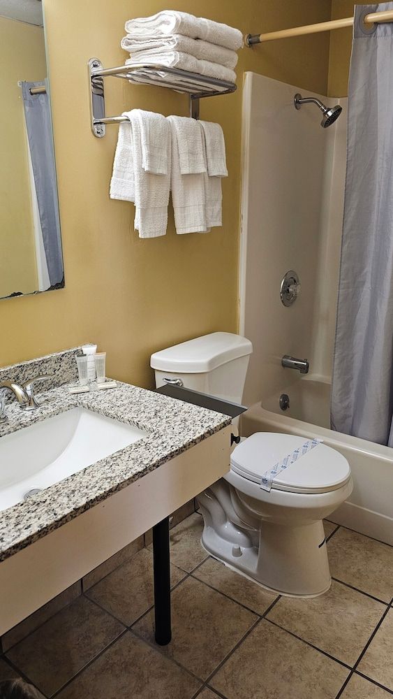 Budgetel Inn and Suites Family Triple Room, 3 Bedrooms, Refrigerator & Microwave 2