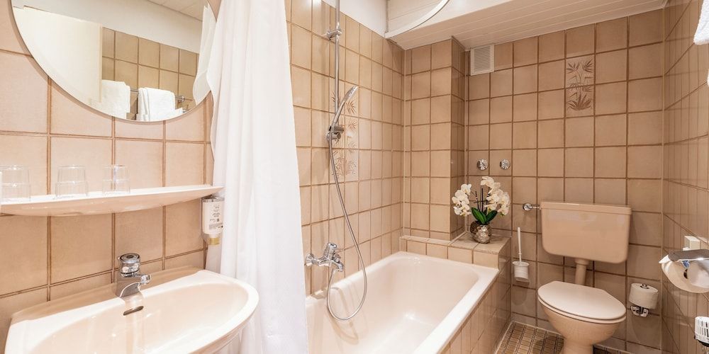 PLAZA INN Rieker Stuttgart Hauptbahnhof Comfort Triple Room 10