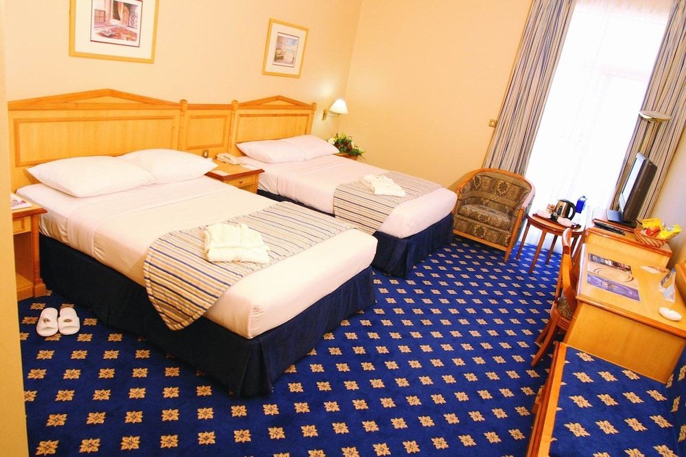 undefined Grand Continental Hotel 10