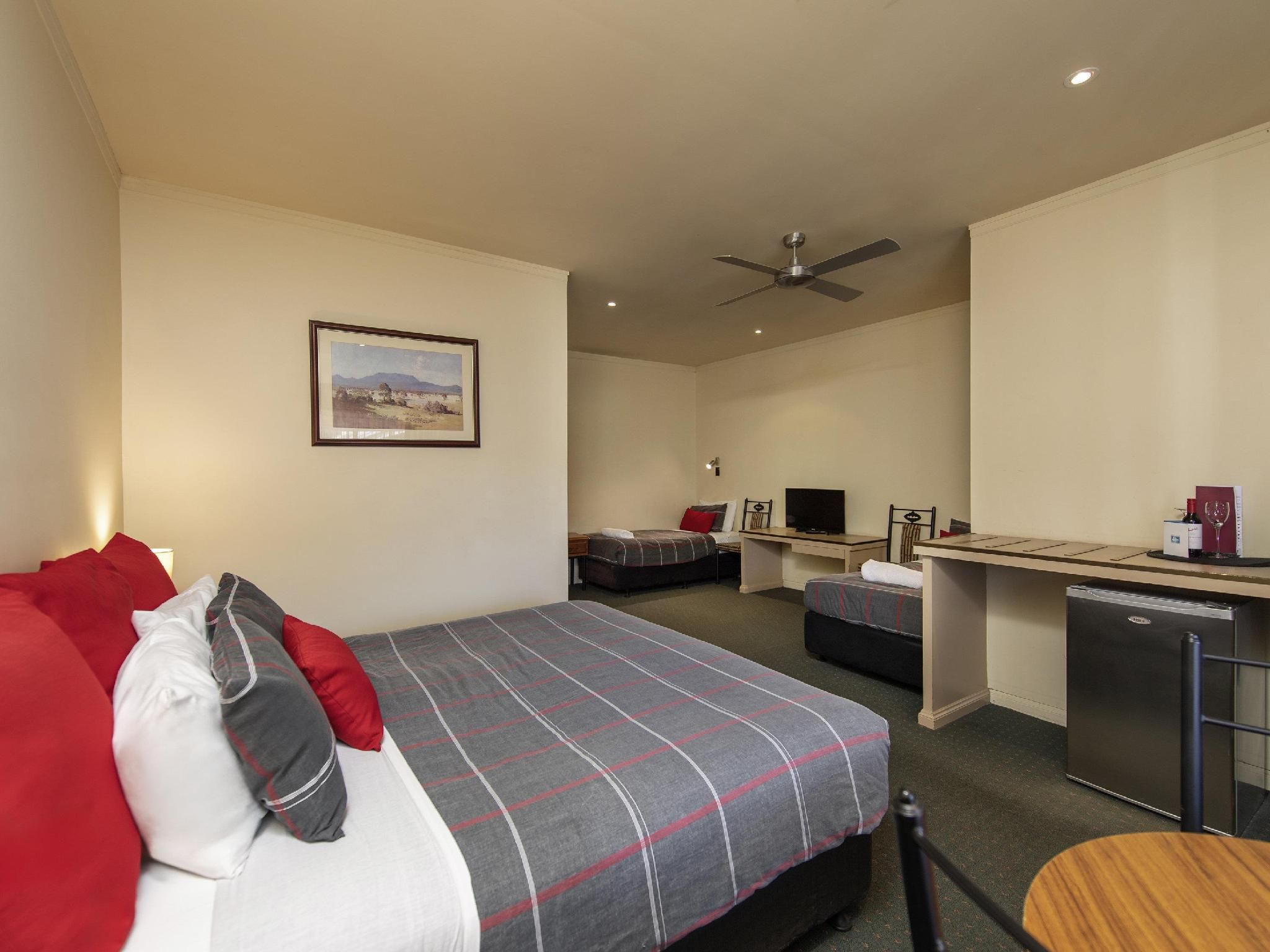 Standard Suite with 1 King size bed and 2 Single beds