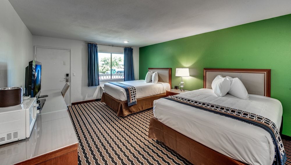 Standard Double Room Single Use, 2 Queen Beds, Refrigerator & Microwave