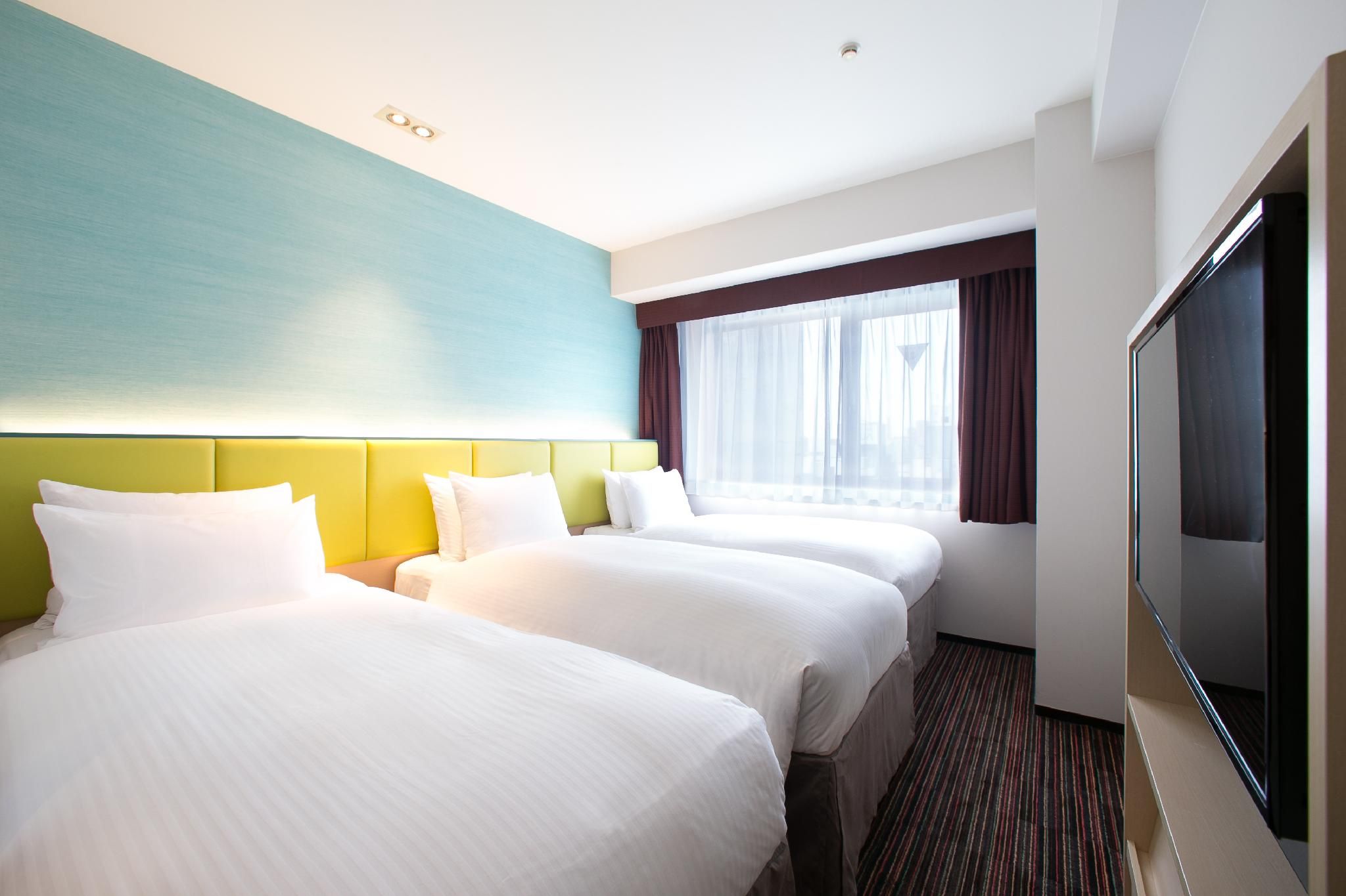 2 Single Beds Standard with Extra Bed