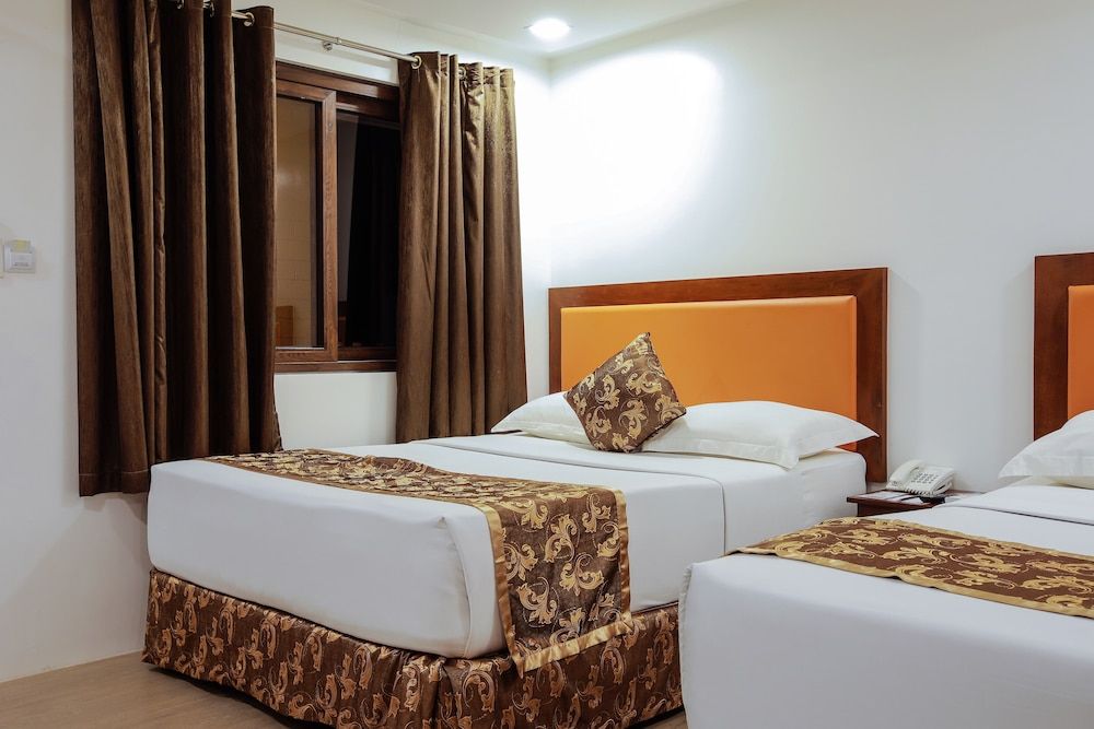 Paradise Garden Hotel and Convention Boracay Powered by ASTON Deluxe Room