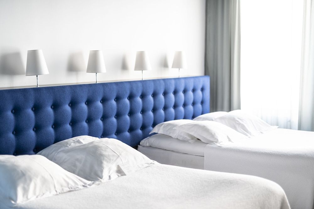 L Twin - Two separate beds, 2-4 persons (beds of 140 cm each)