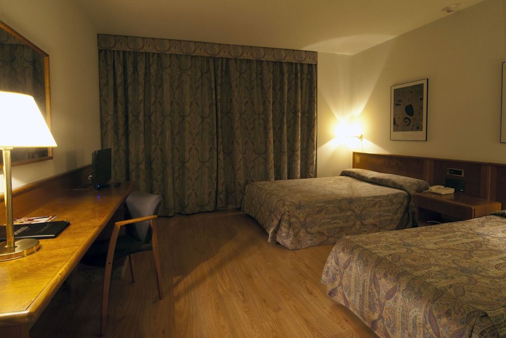 Hotel Domo Quadruple Room