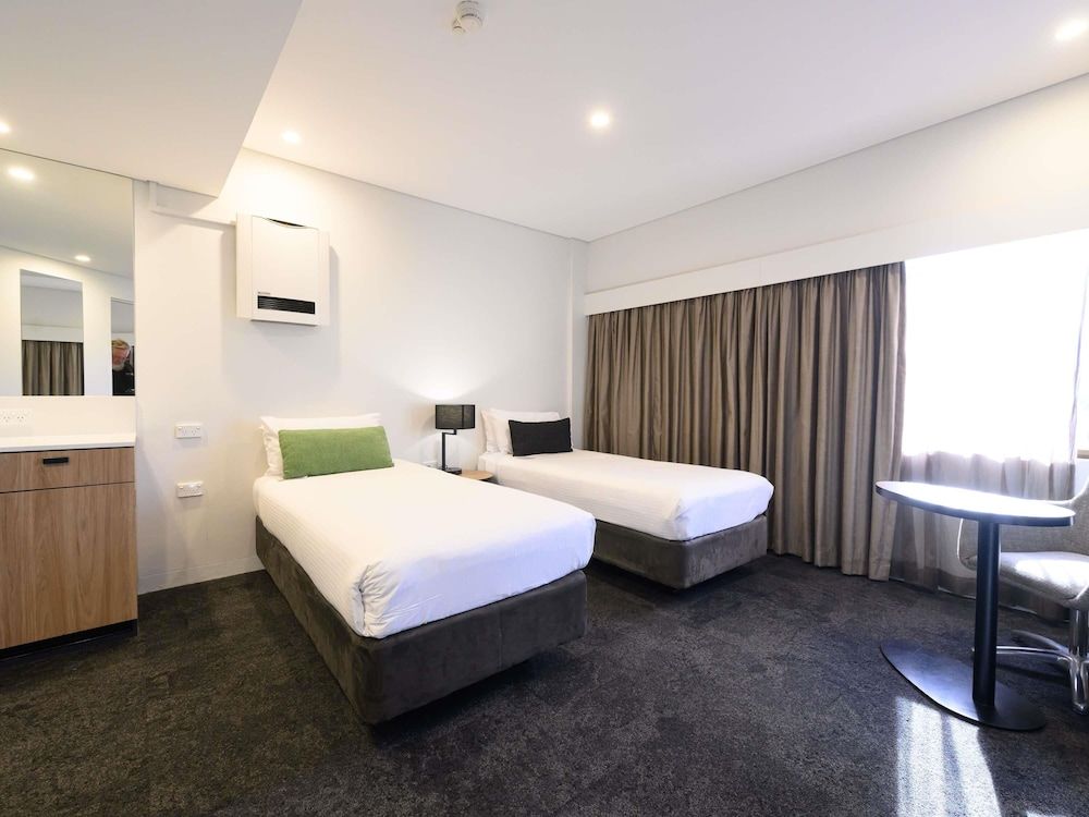 Deluxe Room (1 Queen Bed and 2 Twin Beds)