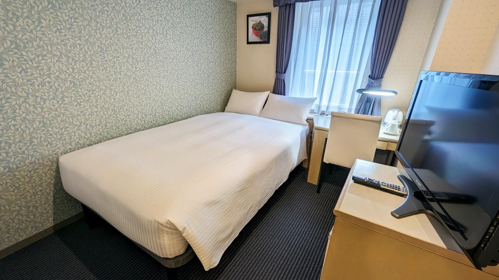 Single Room Non-Smoking (semi-double bed)