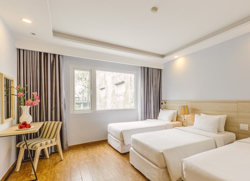 Viet Lotus Saigon Hotel Deluxe Triple 4