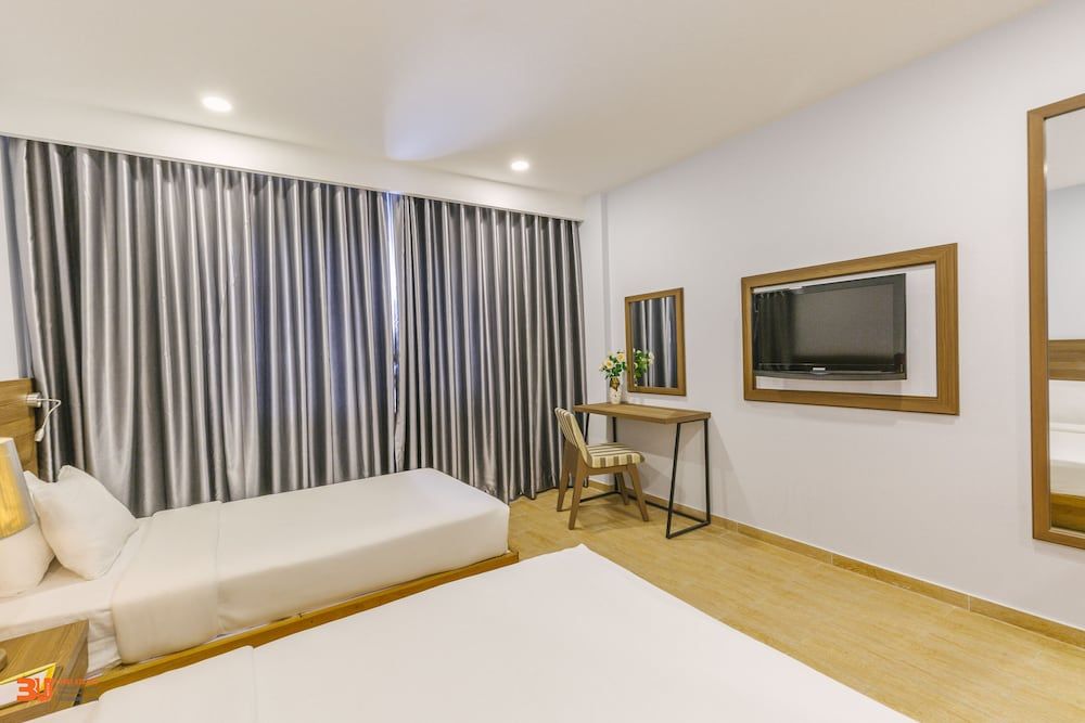 Viet Lotus Saigon Hotel Deluxe Triple 2