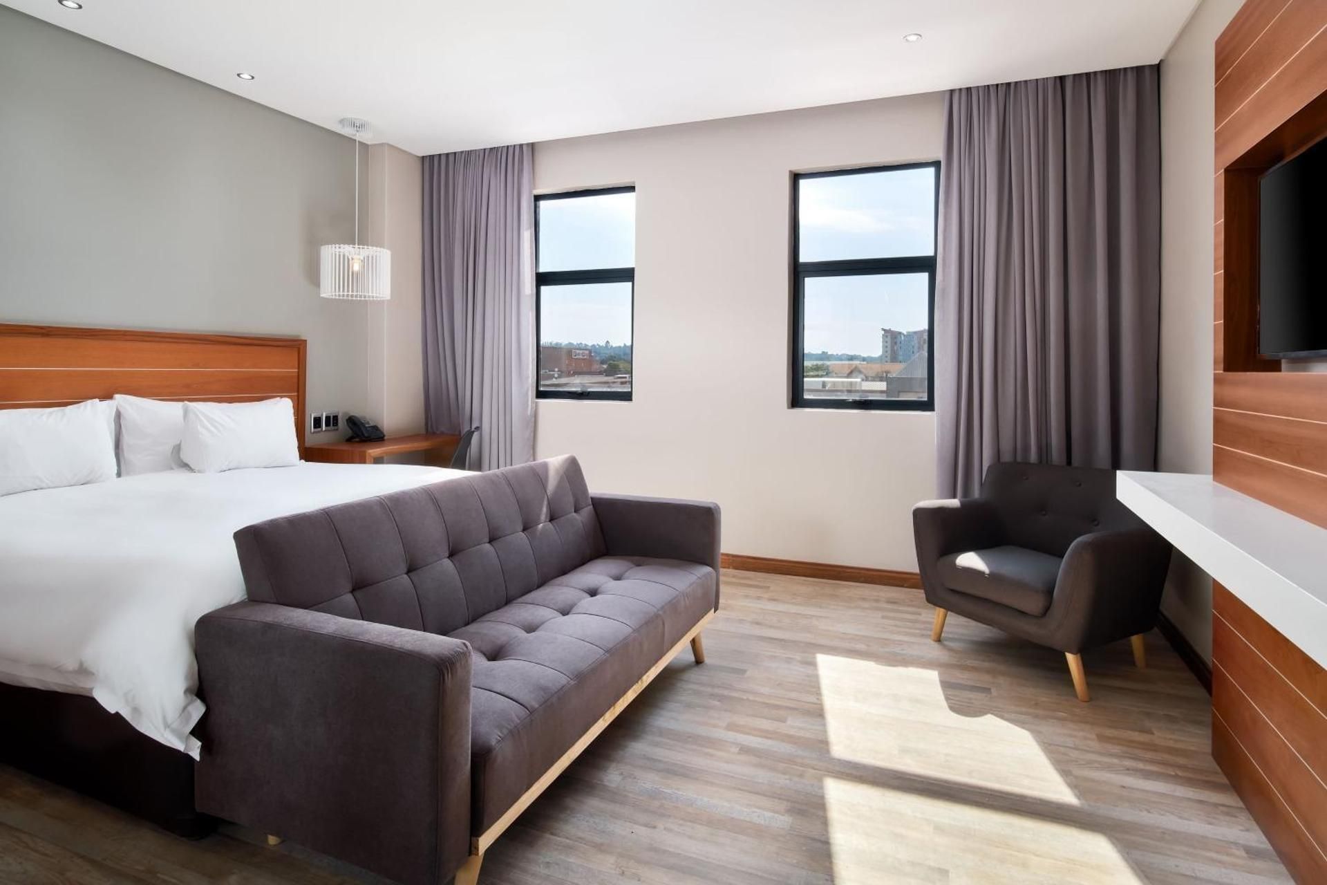 Luxury King Room with Sofa Bed and City View