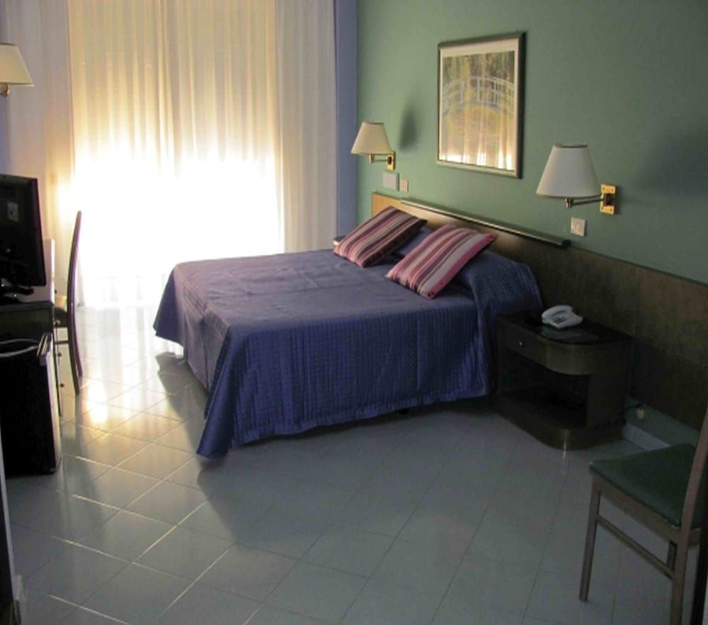 Standard Triple Room, Balcony, Garden View