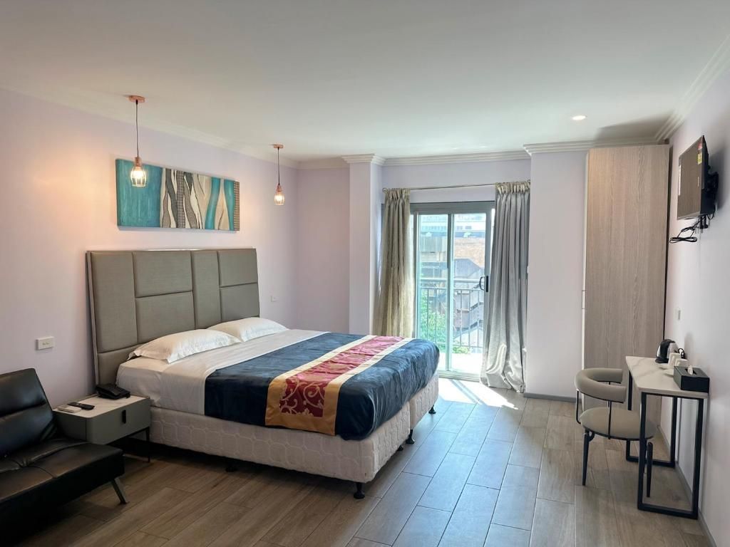 Premium King Room with Balcony - Non-Smoking